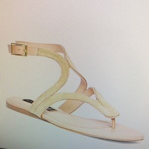Gently used Steven by Steve Madden Resorts Gold Flat Thong Sandals in size 10